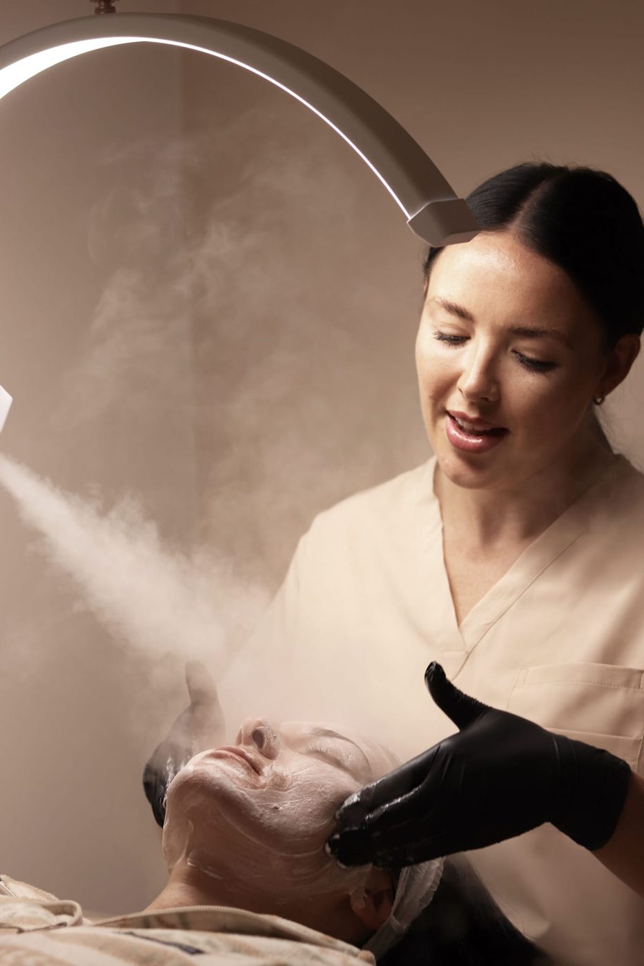 Leanne giving a skin treatment